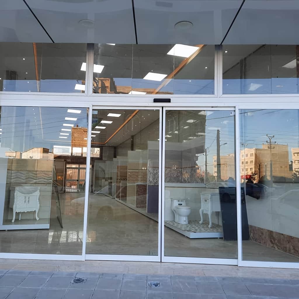 خرید درب اتوماتیک شیشه ای ورودی ساختمان اداری دولنگه