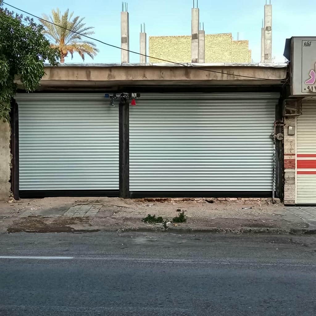 اجرای درب کرکره ای مغازه صنعتی با موتور ساید