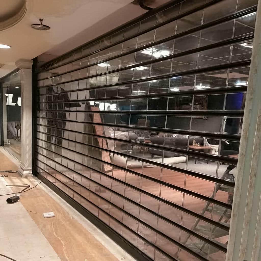 تعمیر کرکره برقی ضد سرقت فروشگاهی و تنظیم ریل