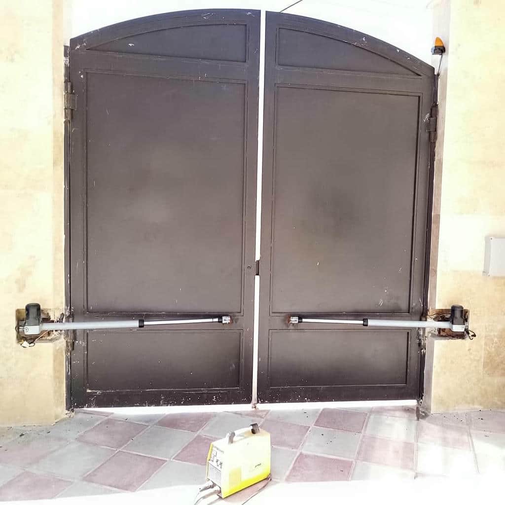 عوامل قیمت جک درب پارکینگ بی صدا و قطعات همراه