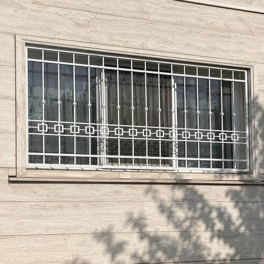 خرید حفاظ پنجره سفید طلایی هماهنگ با سنگ نما