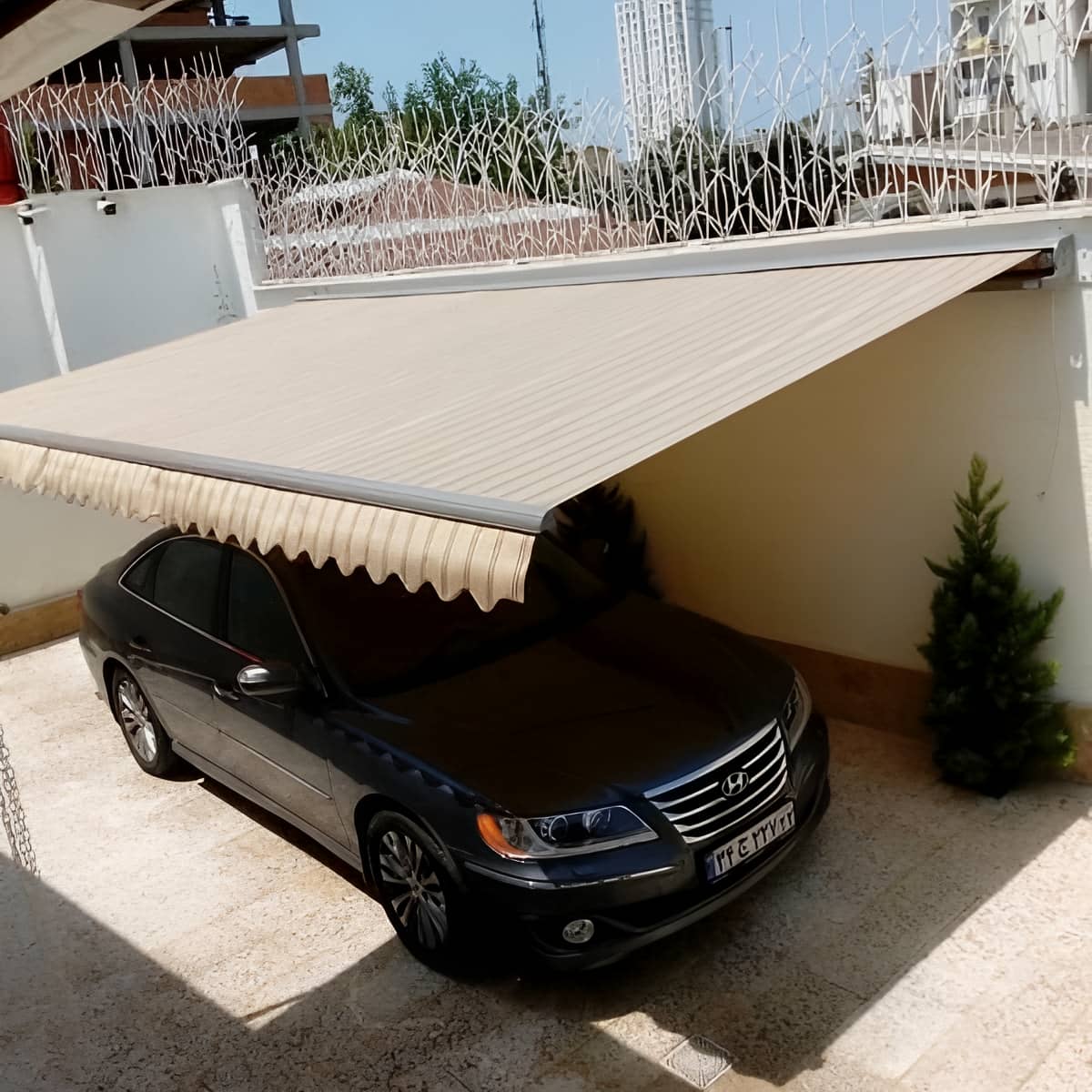 سایبان برقی پارچه کرم در استان هرمزگان