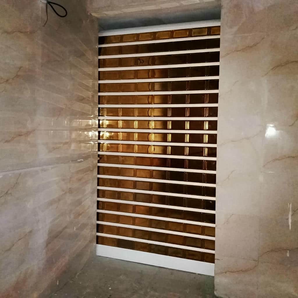 کرکره برقی آلومینیومی ورودی مغازه در سنندج
