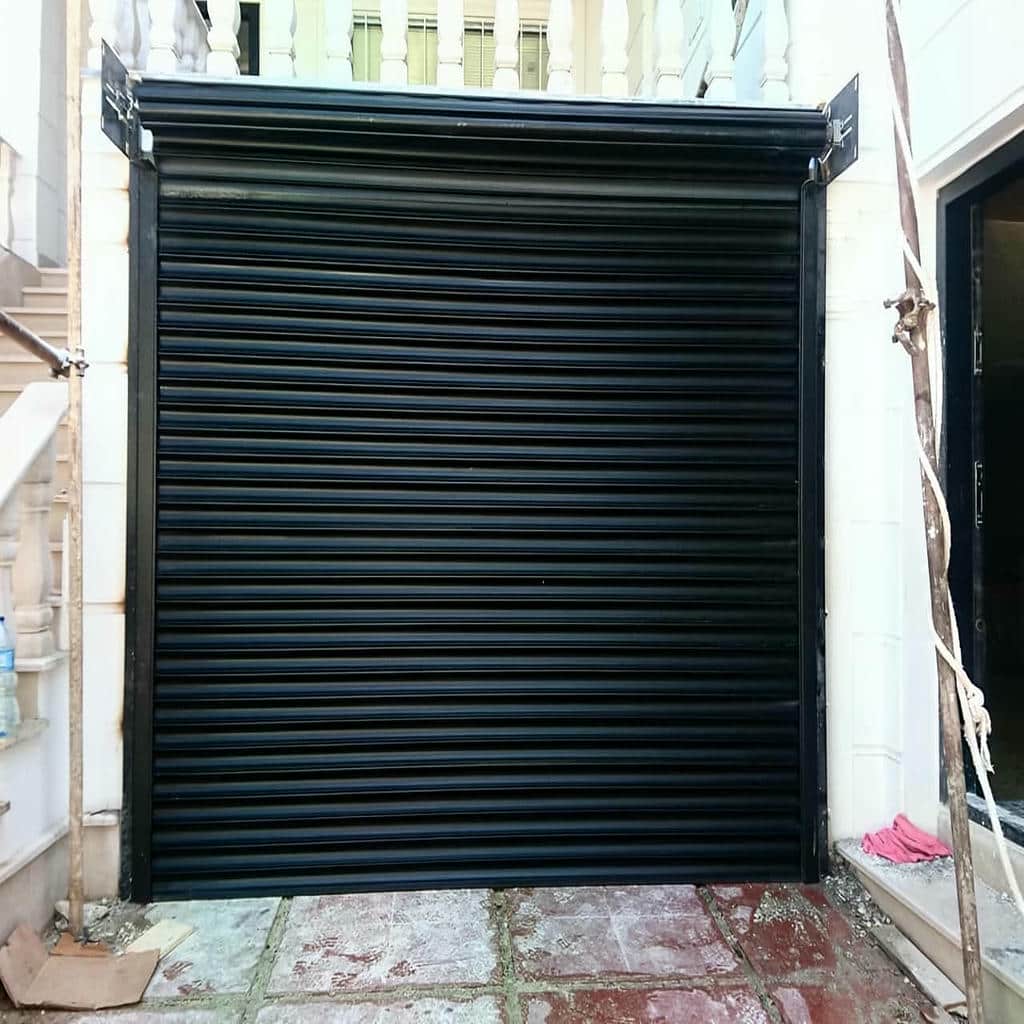 کرکره برقی تیغه خاکستری ورودی فروشگاه استان قم